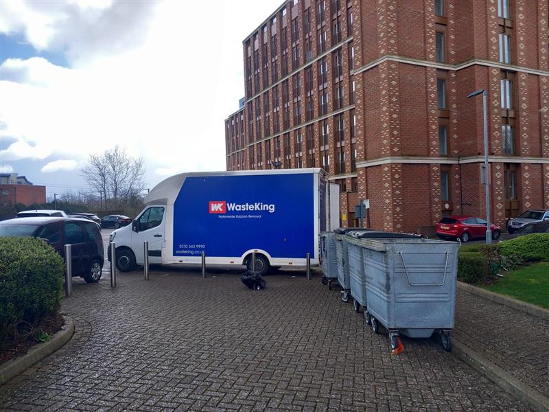 Waste King Van in a residential area